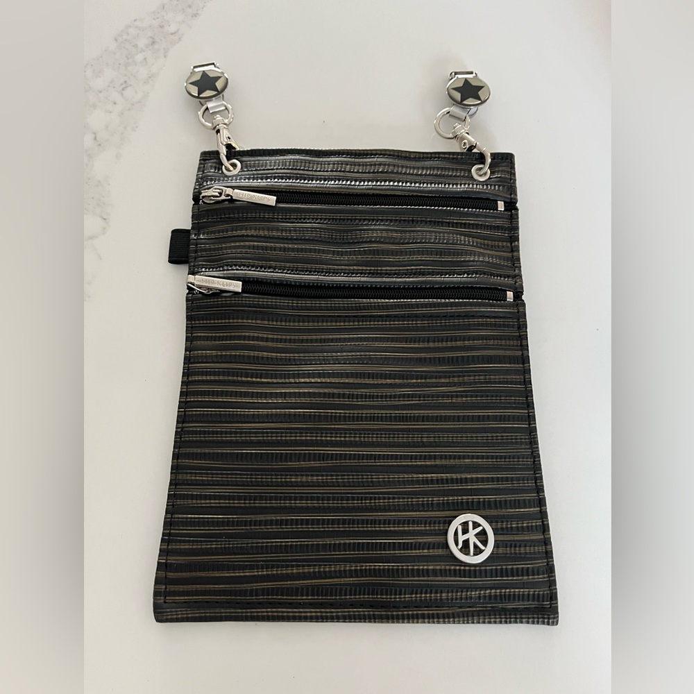 The Hip klip cell pocket accessory.  Three pockets.  Bronze metallic pattern.